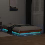 vidaXL Sängram med LED vaxad brun 140x200 cm massiv furu