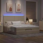 vidaXL Ottoman sängram med madrass gräddvit 160x200 cm tyg