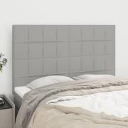 vidaXL Sänggavel ljusgrå 144x5x118/128 cm tyg