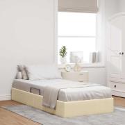 vidaXL Förvaringssäng med huvudgavel med lagring Kräm 100 x 200 cm tyg