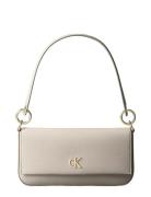 Calvin Klein Minimal Monogram Shoulder Pouch Kräm